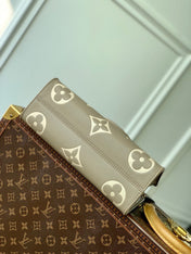 ONTHEGO EAST WEST BAG 25 IN GREEN MONOGRAM EMBOSSED COWHIDE