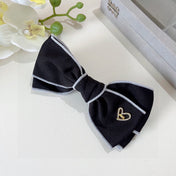 BOW HAIRPIN IN BLACK AND WHITE TRIM COTTON 406022