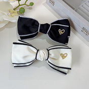 BOW HAIRPIN IN BLACK AND WHITE TRIM COTTON 406022