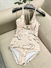 CC BIKINI SWIMSUIT SET IN CREAMY WHITE MIXED WITH CURVED BLACK DETAIL 608919