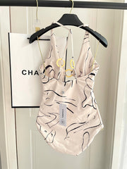 CC BIKINI SWIMSUIT SET IN CREAMY WHITE MIXED WITH CURVED BLACK DETAIL 608919
