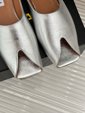 ALAIA FLAT MULE IN SILVER LAMBSKIN
