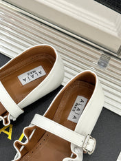 ALAIA 26S MARY JANE FLATS IN WHITE LAMBSKIN WITH BOW