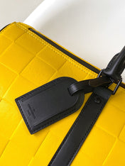 KEEPALL BANDOULIÈRE 50 IN YELLOW DAMIER SCUBA CALFSKIN