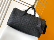 LV 25S KEEPALL BANDOULIÈRE BAG 50 IN BLACK EMBOSSED TAURILLON CALFSKIN MONOGRAM