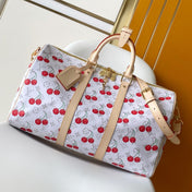 KEEPALL BANDOULIÈRE 45 IN WHITE AND RED CALFSKIN