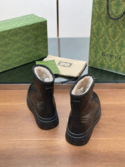 GG UGG BOOTS IN BLACK EMBOSSED SUEDE AND BEIGE WOOL LINING