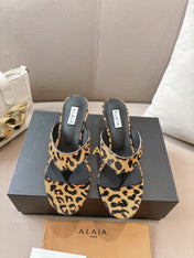 ALAIA HEELED THONG 25S 55 MM IN LEOPARD PONY HAIR LEATHER