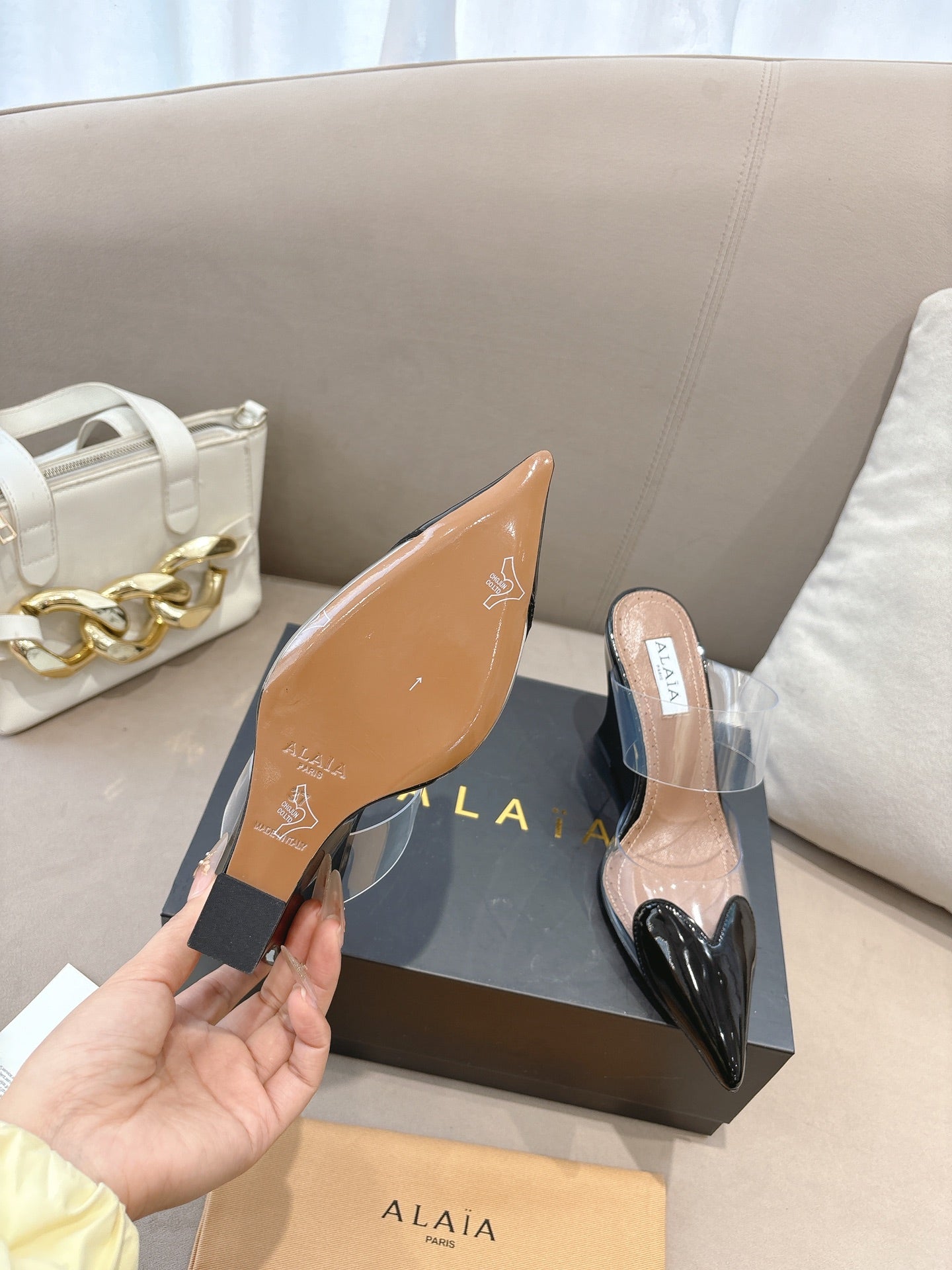 ALAIA 26S HIGH-HEEL WEDGE MULES 95 MM IN BLACK GLOSSY CALFSKIN