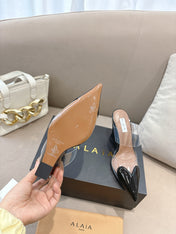 ALAIA 26S HIGH-HEEL WEDGE MULES 95 MM IN BLACK GLOSSY CALFSKIN