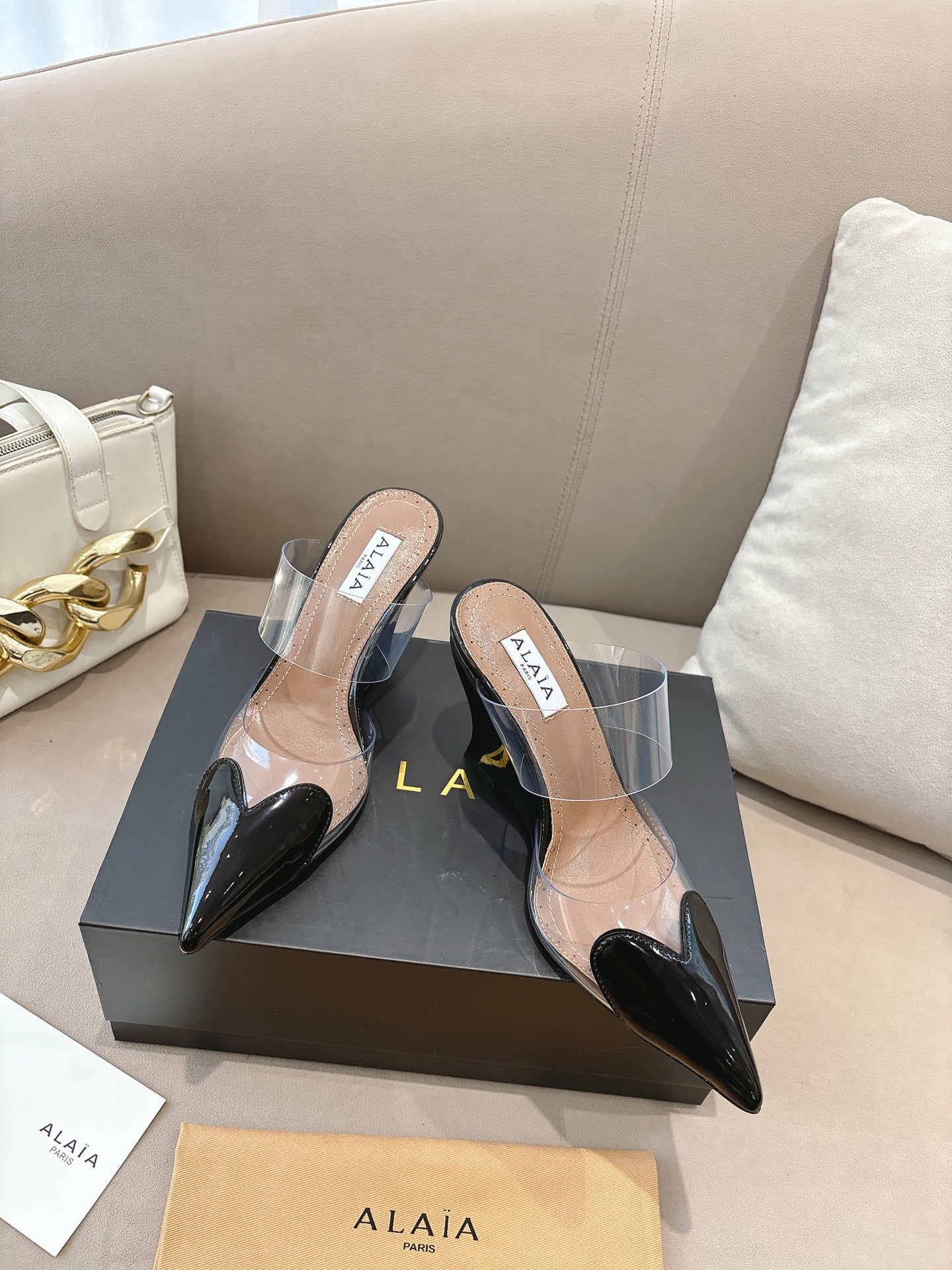 ALAIA 26S HIGH-HEEL WEDGE MULES 95 MM IN BLACK GLOSSY CALFSKIN