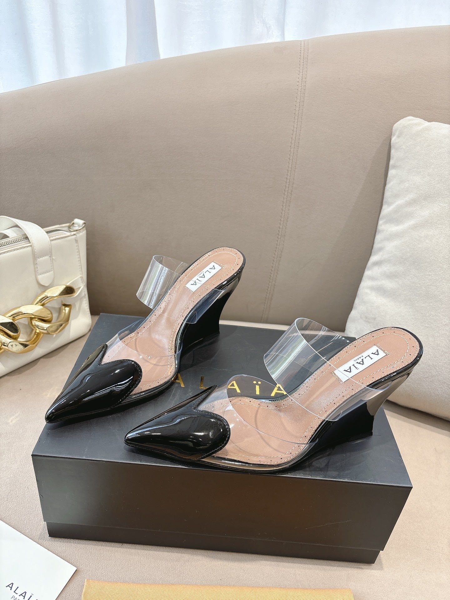 ALAIA 26S HIGH-HEEL WEDGE MULES 95 MM IN BLACK GLOSSY CALFSKIN