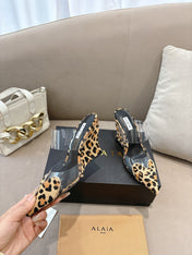 ALAIA 26S HIGH-HEEL WEDGE MULES 95 MM IN LEOPARD PRINT PONY HAIR