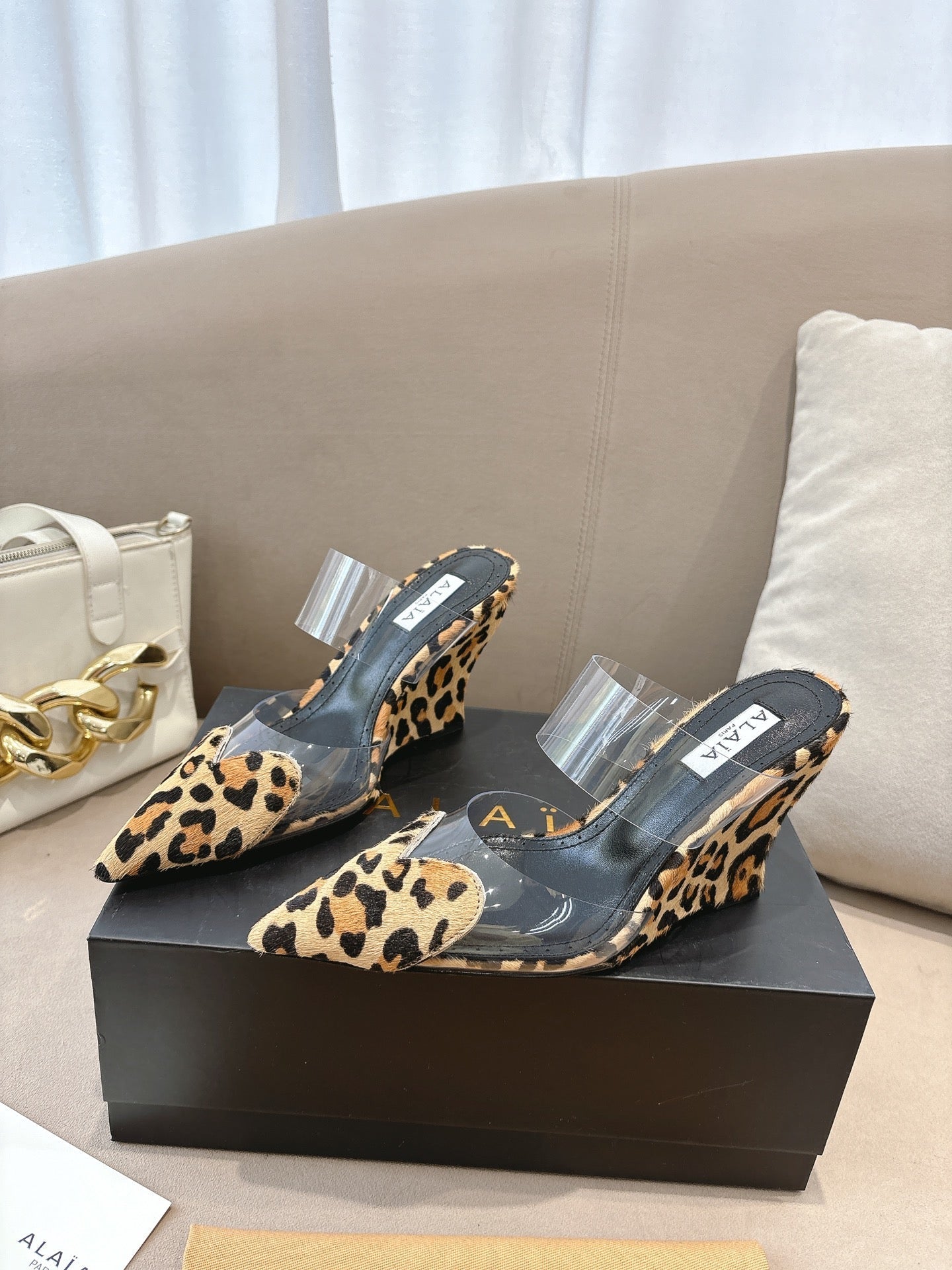 ALAIA 26S HIGH-HEEL WEDGE MULES 95 MM IN LEOPARD PRINT PONY HAIR