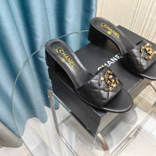 MULE SLIDE SANDAL IN BLACK LAMBSKIN