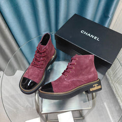 SHORT BOOTS IN MAGENTA PURPLE SUEDE AND BLACK SHEEPSKIN