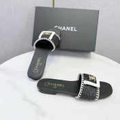 CHANEL 26S WOVEN STRAP SLIDES IN BLACK LAMBSKIN