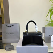 HOURGLASS HANDBAG 19 IN BLACK SHINY BOX CALFSKIN GOLD HARDWARE