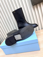 PRADA 25S LOW-CUT BOOTS IN BLACK LAMBSKIN