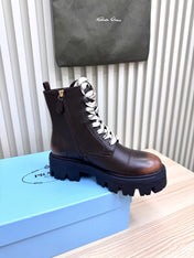 PRADA 25S MONOLITH BOOTS IN DARK BROWN CALFSKIN