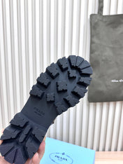 PRADA 25S MONOLITH BOOTS IN DARK BROWN CALFSKIN