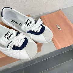 White Leather Ballet Flats With Black