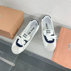 White Leather Ballet Flats With Black