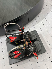 ALAIA BANQUET WEDGE SANDALS IN BLACK LAMBSKIN WITH RED HEART