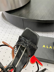 ALAIA BANQUET WEDGE SANDALS IN BLACK LAMBSKIN WITH RED HEART