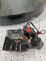 ALAIA BANQUET WEDGE SANDALS IN BLACK LAMBSKIN WITH RED HEART