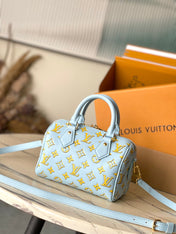 SPEEDY BANDOULIÈRE 20 IN SKY YELLOW MONOGRAM CALFSKIN GOLD BUCKLE