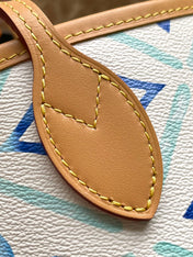 NEVERFULL MM 31 IN LAGOON BLUE MONOGRAM TILES CANVAS