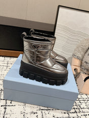 MONOLITH ANKLE BOOTS IN METALLIC GRAY CALFSKIN AND LAMB FUR LINING