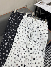ALL-OVER LOGO PRINTED PANTS WITH STRETCH WAIST