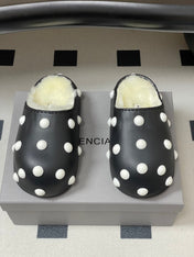 BALENCIAGA 25S FUR-LINED MULES IN BLACK AND WHITE FAUX LEATHER