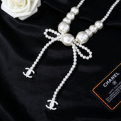 CHANEL 25S CHAIN BELT IN WHITE PEARL WITH BOW 614475