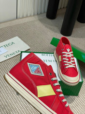 ELIOT SNEAKER IN CHERRY RED CANVAS AND CALFSKIN