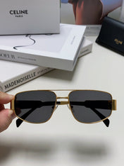 TRIOMPHE SUNGLASS 513000 IN GOLD METAL BLACK LENSES
