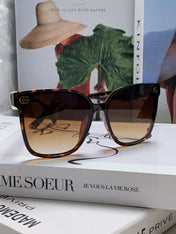 EMBOSSED LOGO BUTTERFLY FRAME SUNGLASSES 576876 IN ACETATE