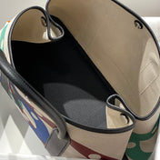 GARDEN PARTY 36 IN MULTICOLOR TOILE H CANVAS BLACK CALFSKIN OVERLAPPING POLKA RINGS PRINT