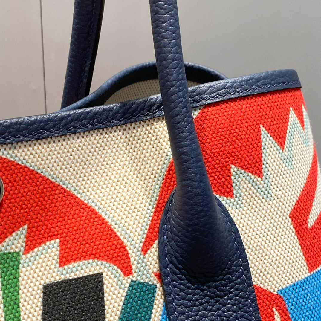 GARDEN PARTY 36 IN MULTICOLOR TOILE H CANVAS BLUE NAVY CALFSKIN TROPICAL ABSTRACT LANDSCAPE PRINT