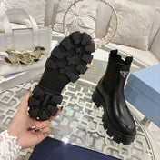 PRADA 26S MONOLITH CHELSEA BOOTS IN BLACK CALFSKIN AND FABRIC