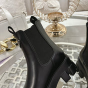 PRADA 26S MONOLITH CHELSEA BOOTS IN BLACK CALFSKIN AND FABRIC