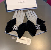 GLOVES IN DOVE GRAY WOOL WITH LARGE BLACK BOW 464994