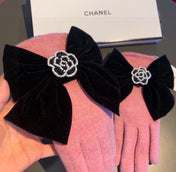 GLOVES IN FLAMINGO PINK WOOL WITH LARGE BLACK BOW 464995