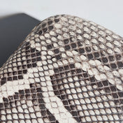 KNOT CHAIN CLUTCH 20.5 IN SNAKE PATTERN CALFSKIN