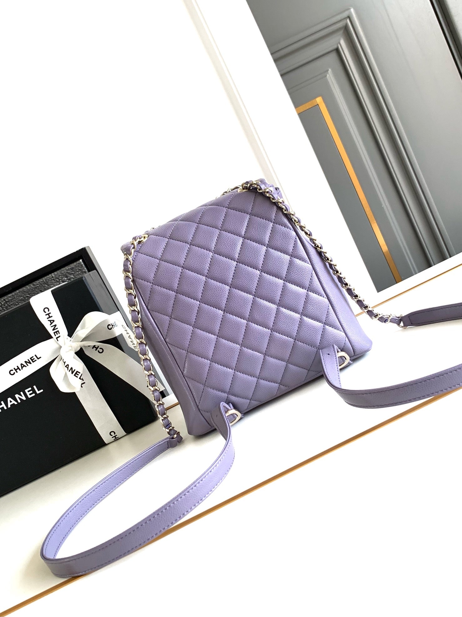 CHANEL 25S BACKPACK 21 CM IN PURPLE LAMBSKIN