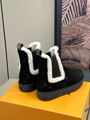 ASPEN CHELSEA ANKLE BOOTS IN BLACK MONOGRAM-DEBOSSED SUEDE