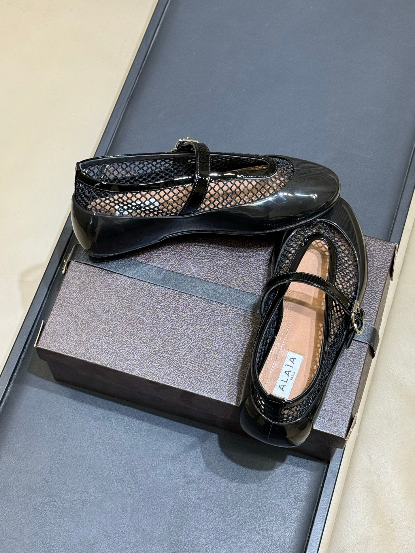 ALAIA 26S MARY JANE BALLET FLATS IN BLACK MESH AND GLOSSY CALFSKIN