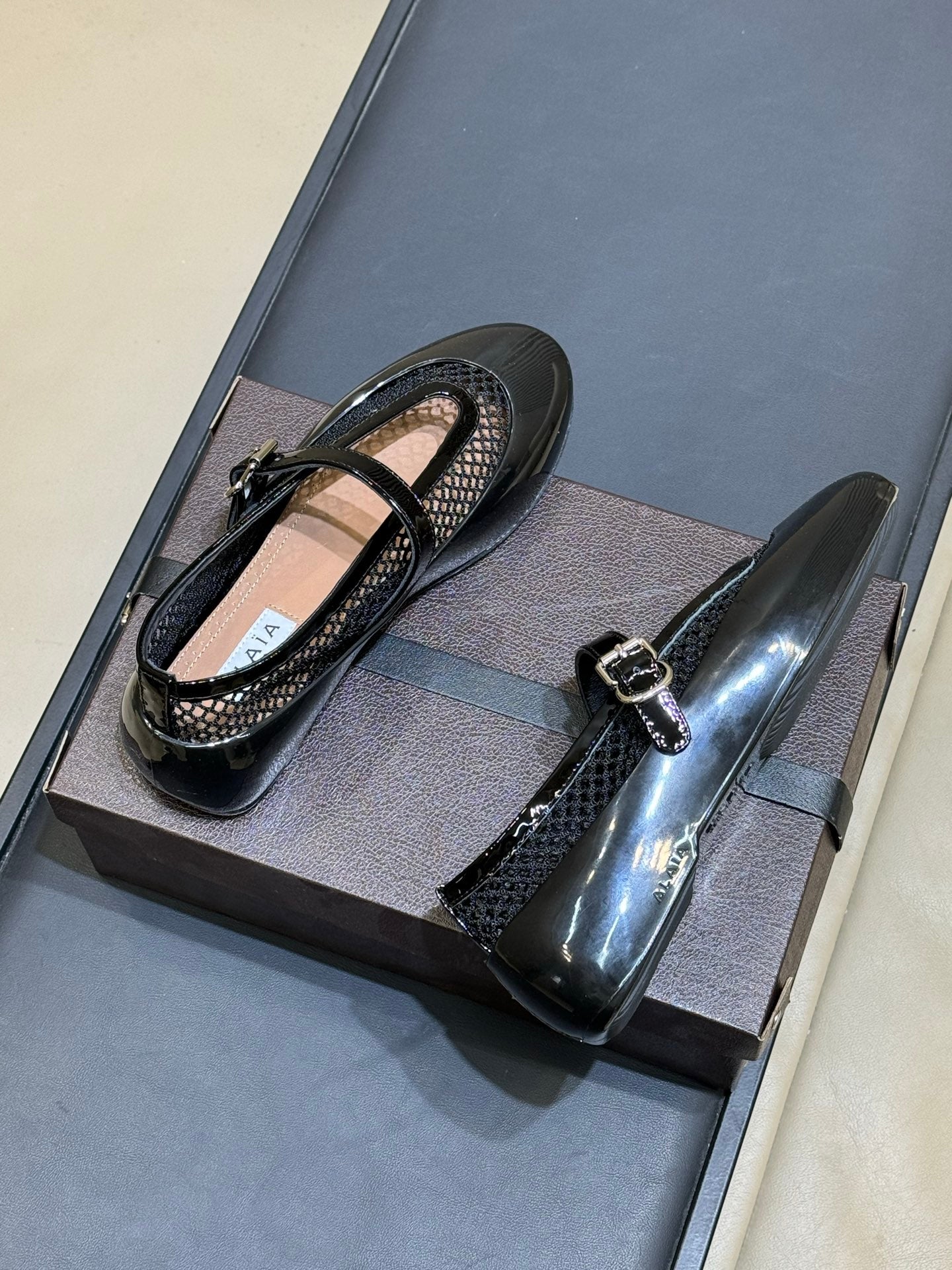 ALAIA 26S MARY JANE BALLET FLATS IN BLACK MESH AND GLOSSY CALFSKIN